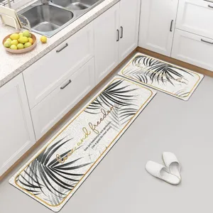 Moderne keukenmat set antislip waterdichte loper met tropisch bladontwerp voor thuisvloeren.