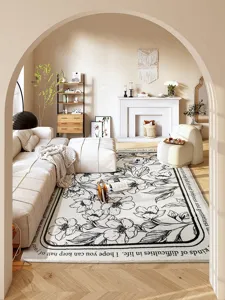 Alfombra de salón nórdica moderna blanca con arte floral negro y texto inspirador elegante.