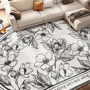 Alfombra de salón imitación cachemira estilo nórdico Wabi-Sabi con flores en blanco y negro.