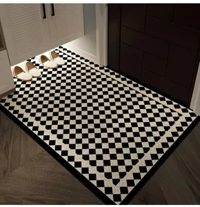 Modern minimalist black and white checkered entry floor mat durable scraper door mat detail