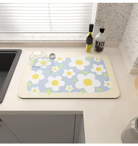 Kitchen absorbent drying mat, cute daisy pattern tech cloth dish drying pad for cups and bowls.