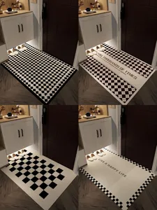 Modern minimalist entrance door mat with black and white grid patterns for home hall.