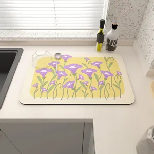 Fresh floral kitchen drying mat, absorbent tech cloth counter mat for dishes and cups.