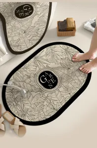 Tapis de bain absorbant avec imprimé de feuilles botaniques rétro, design ovale antidérapant.