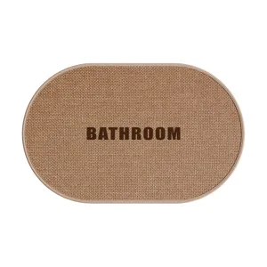 Oval brown woven bathroom mat, absorbent anti-slip floor rug for toilet main view display
