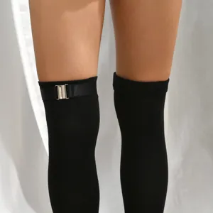 Black over-the-knee socks with stylish metal buckle thigh strap for women daily wear accessory.