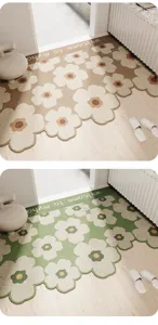 Detailed view of the cute ins style floral doormat, anti-slip PVC looped mat for entrance.