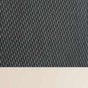 Detail shot of black loop mat texture, showing anti-slip wire construction for entrance.