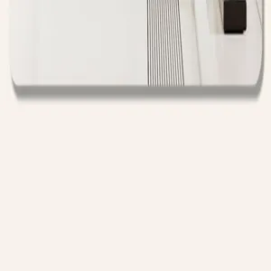 Close-up detail of modern floor mat showing clean white surface and black vertical stripes.