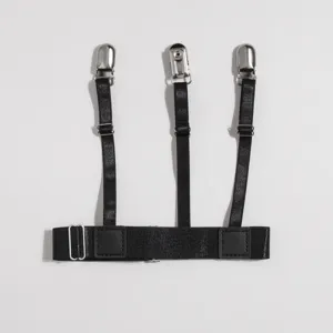Vista detallada de tirantes de camisa elásticos negros, clips metálicos ajustables.