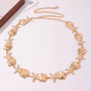 Gold metal waist chain featuring delicate seashell, starfish charms, and pretty pearl accents.