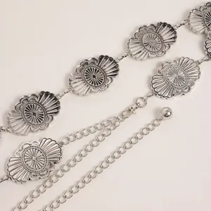 Vintage western style silver metal waist chain with carved concho plates for women fashion.