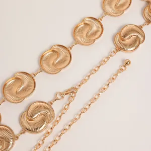 Vintage gold metal waist chain for women, retro carved circle links belly body jewelry.