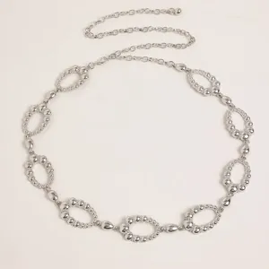 Stylish retro carved metal waist chain for women, chic oval link design perfect for dresses.