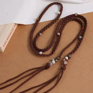 Bohemian woven waist belt for women with colorful beads, brown cotton rope and elegant tassels.