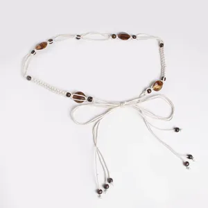 Bohemian woven waist belt for women with wooden beads and elegant bow knot detail vacation style.