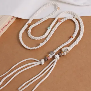 Bohemian braided waist rope with colorful beads and tassel design for women fashion vacation style.
