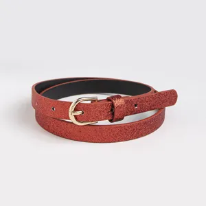 Ceinture scintillante pour enfants vue détaillée avec finition brillante et boucle dorée.