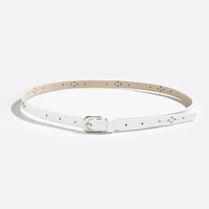 Women white slim faux leather belt detail showing metal buckle studs and delicate cutout holes.