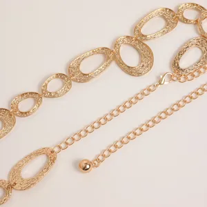 Vintage gold tone metal chain belt for women, retro carved oval link waist jewelry stylish.