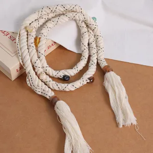 Bohemian woven cotton waist rope with colorful beads and chic tassel ends for women.