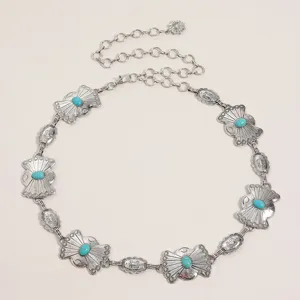 Chaine de taille en métal argenté style boho avec pierres turquoise, design sculpté pour femmes.