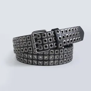 Punk style black leather belt with triple row square metal eyelets and double prong buckle.