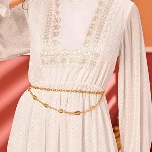 Exquisite double layer metal waist chain with leaf and shell charms, boho style design.