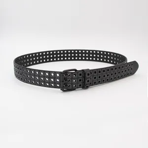 Punk style black leather belt with multi-row square metal eyelets, trendy accessory for women.