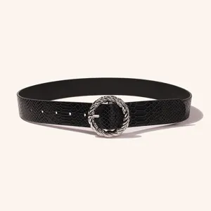 Close-up detail of black snakeskin PU leather belt featuring silver twisted round metal buckle.