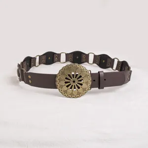Vintage western style women leather belt with antique bronze floral buckle and metal rings.