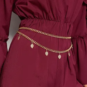 Gold layered leaf waist chain for women, bohemian metal chain belt for dress apparel details.