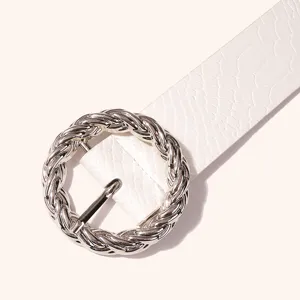 White PU leather belt featuring a chic snakeskin texture and a bold silver twisted round buckle.