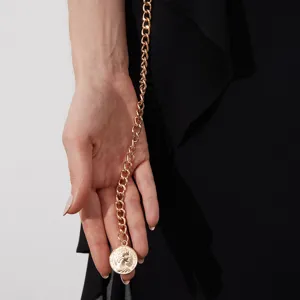 Exquisite gold metal waist chain with coin pendant, elegant accessory for women's dresses.