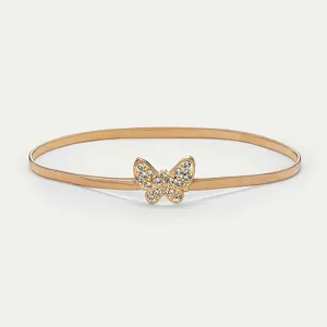 Close-up detail of the elegant rhinestone butterfly buckle on a gold metallic spring waist chain.