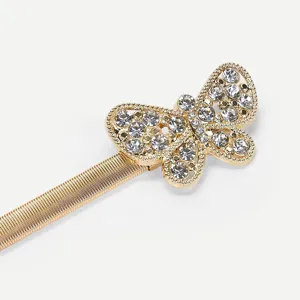 Exquisite rhinestone butterfly detail on a gold spring waist chain for women elegant look.