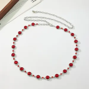Stunning silver rhinestone waist chain for women, featuring sparkling red crystals in detailed view.