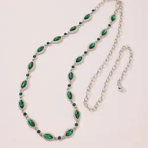 Elegant women's silver chain belt featuring sparkling green marquise rhinestones for chic style.