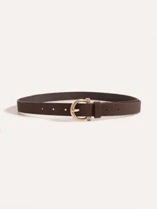 Detailed shot of a sleek brown PU leather women's belt featuring a shiny gold horseshoe buckle.