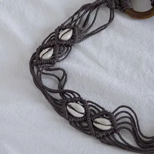 Bohemian handmade braided wax cord belt with natural cowrie shells and wooden ring for women vacation.