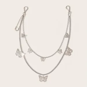 Silver multi-layer waist chain detail, metal butterfly pendant design for women streetwear.