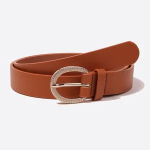 Close-up detail of the vintage PU leather belt with a chic metallic oval rhinestone buckle.