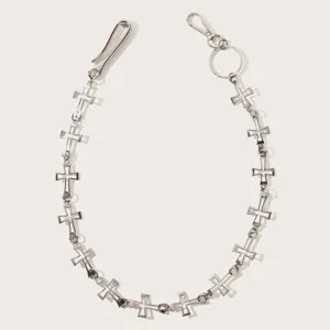 Metal cross pants chain detail showing gothic hip-hop waist chain links and hook hardware.
