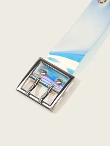 Close-up of transparent iridescent PVC belt with silver double-prong metal buckle and eyelets.