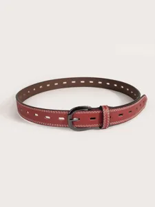 Detailed view of a stylish women's red hollowed leather belt with contrast stitching and buckle.