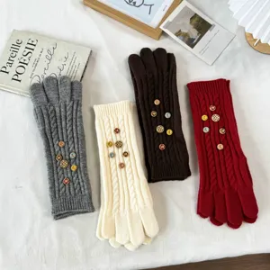 Long knit touchscreen gloves with colorful decorative buttons, cozy winter thermal hand warmers.