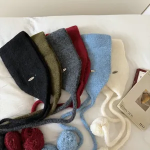 Korean style knit bonnet hat with pom pom ties for women, warm winter knitted ear flaps.