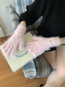 Pink fluffy touchscreen gloves detail view, soft plush split-finger winter warm gloves.