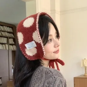 Cozy winter knitted polka dot bonnet hat with ear flaps and ties, warm plush ear muffs.