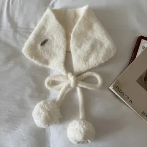 Korean style white knitted ear warmer with cute pom-pom ties, cozy autumn winter accessory.